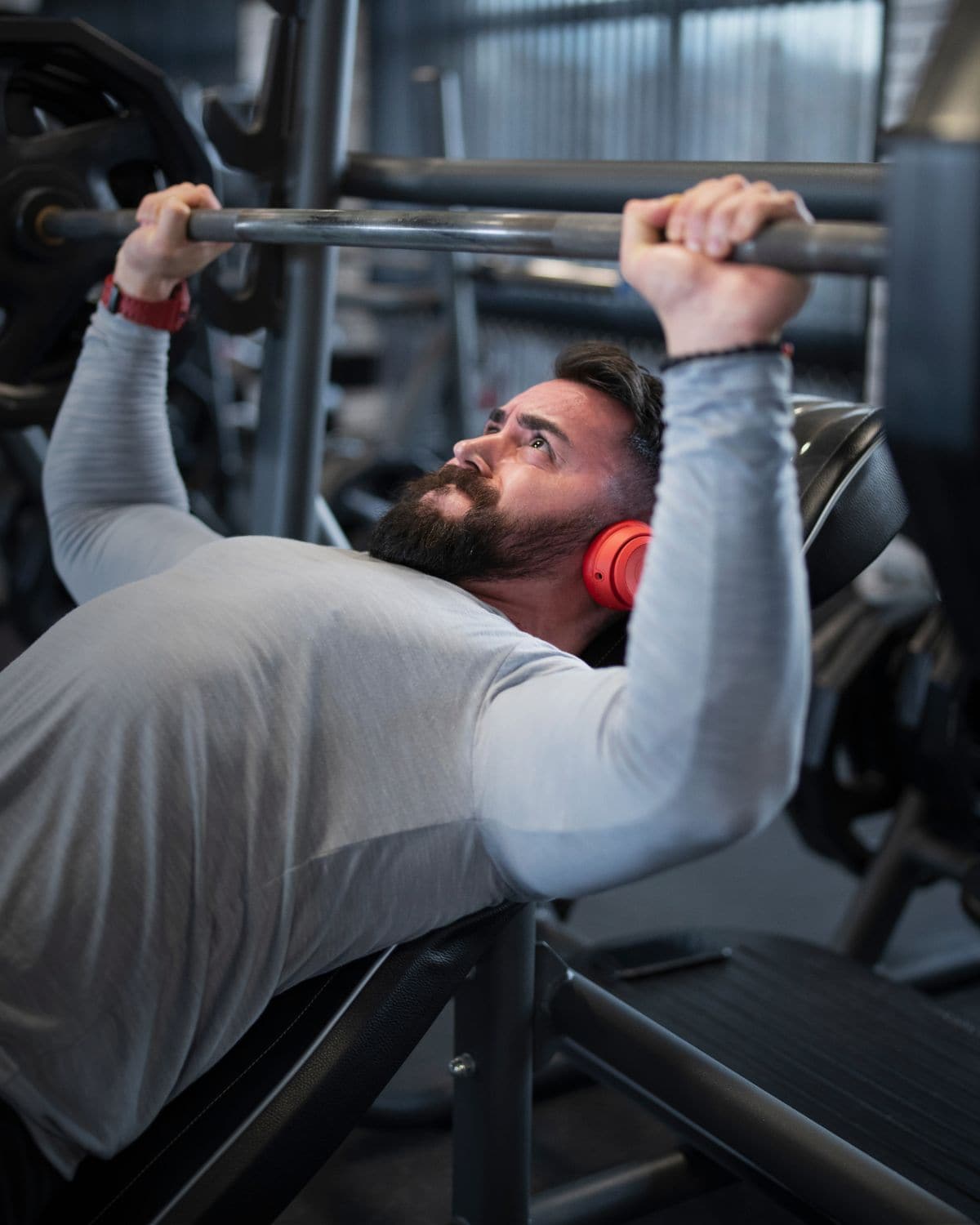 Athlete bench pressing in the gym